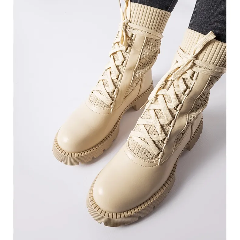 Beige openwork sock boots by Portico