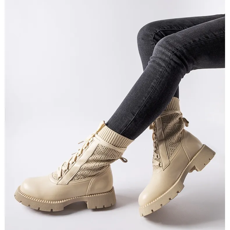 Beige openwork sock boots by Portico