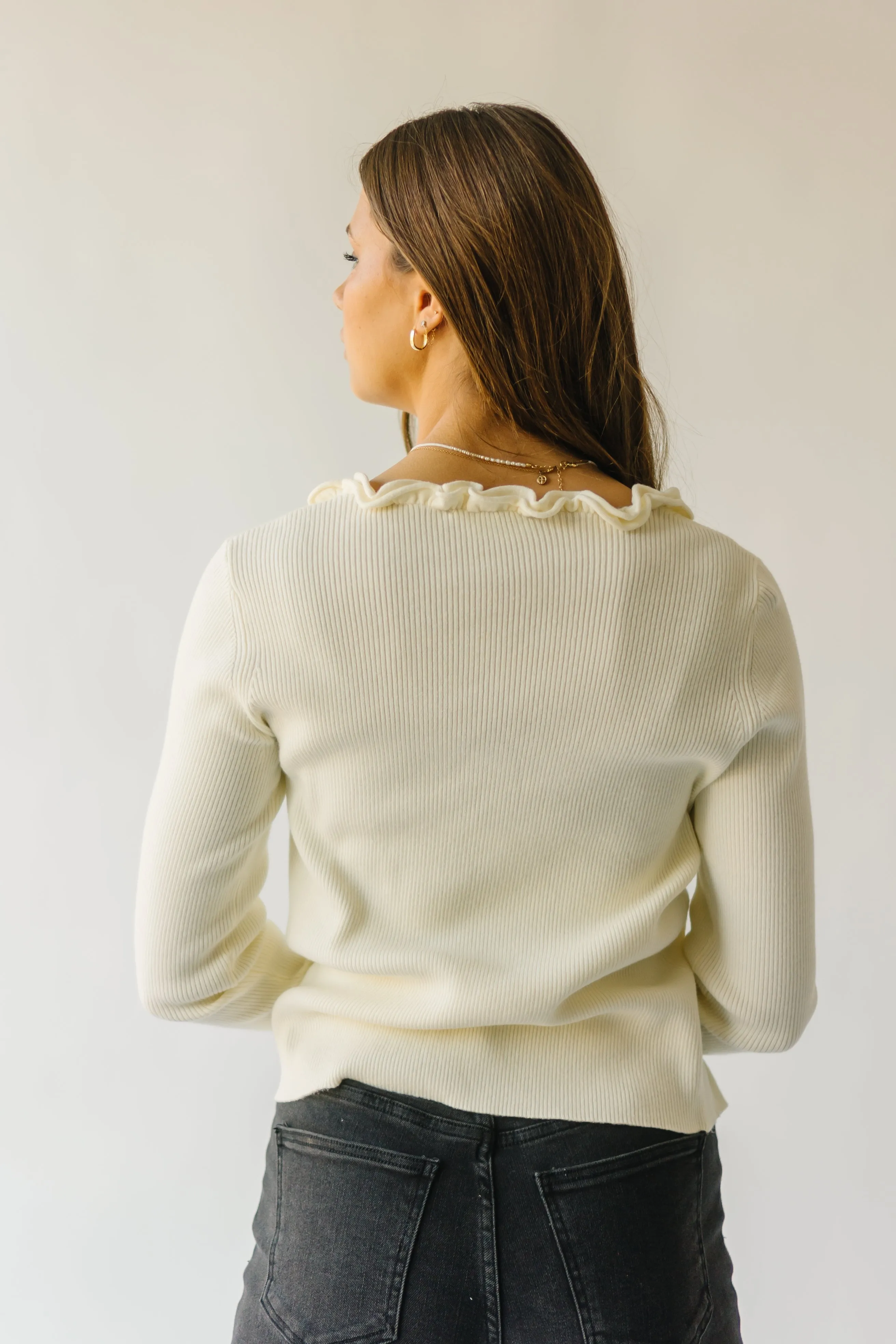 The Sagola Frill Hem Cardigan in Cream